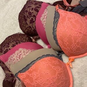 Three Victorias Secret bras size 32D. One Aerie bra size 32D.